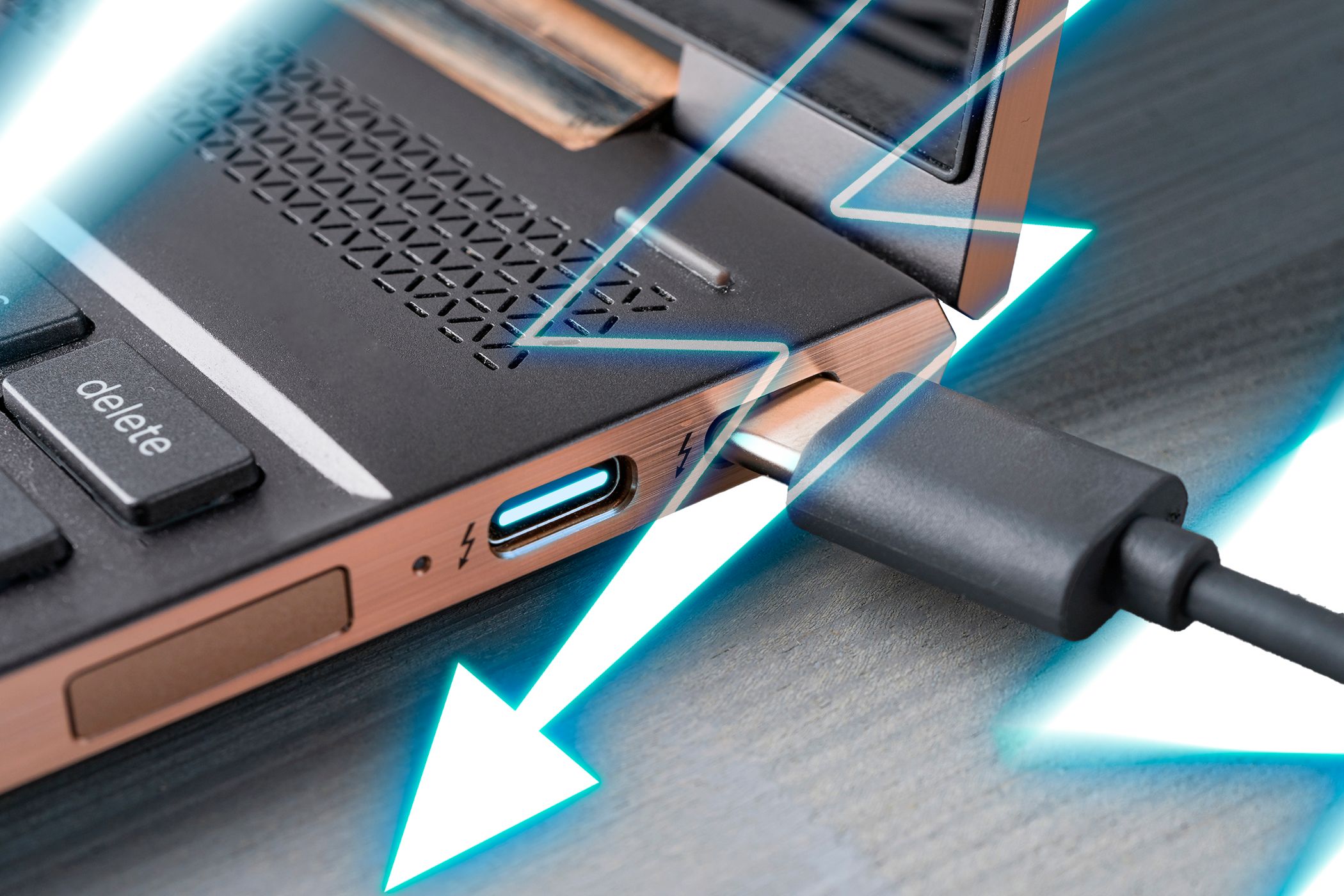 close-up-photo-of-a-laptop-with-a-thunderbolt-usb-c-port-and-a-thunderbolt-icon.jpg