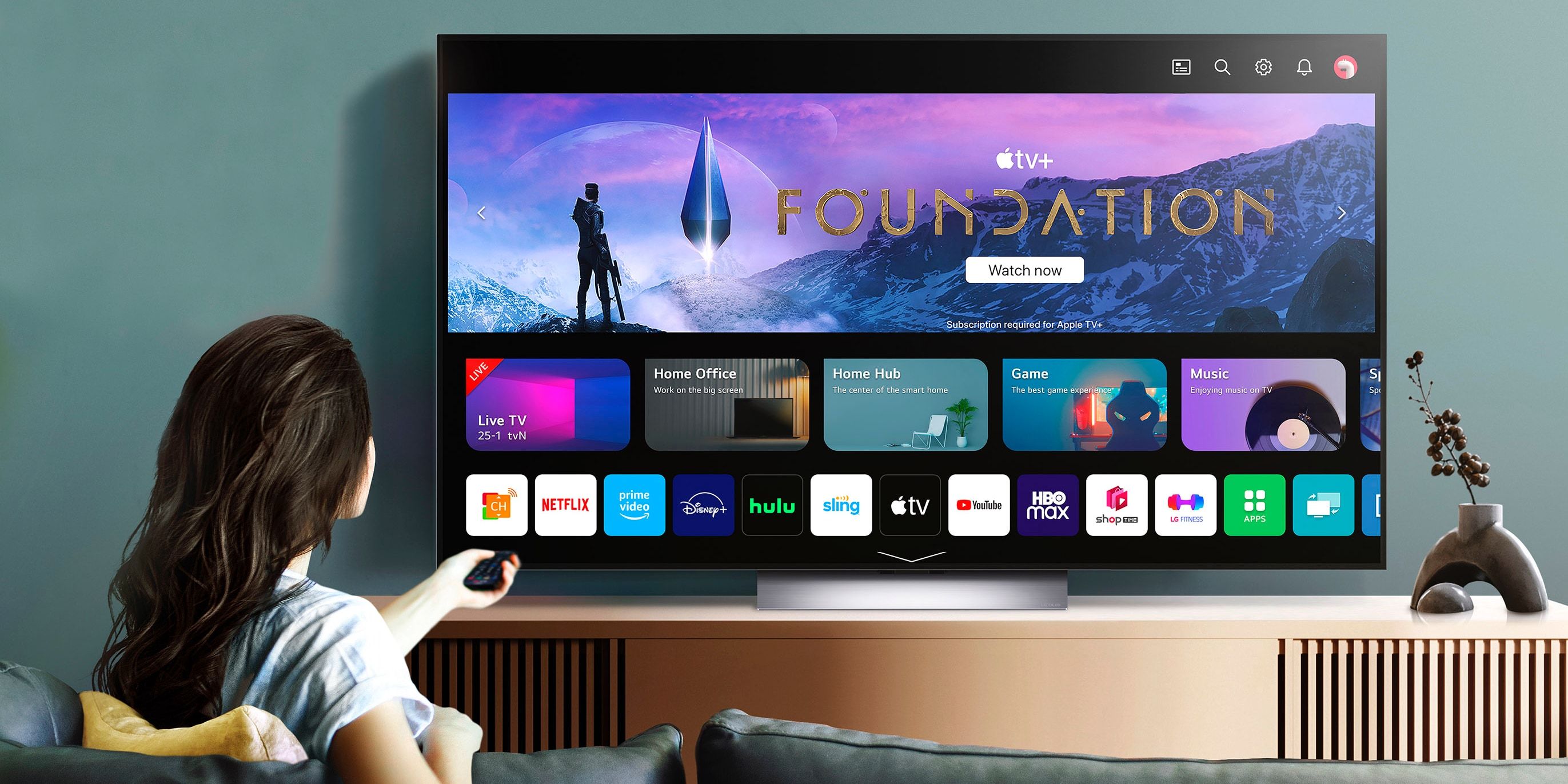 lg-oled-evo-tv-lifestyle-woman-couch-foundation-apple-tv-plus-show.jpg